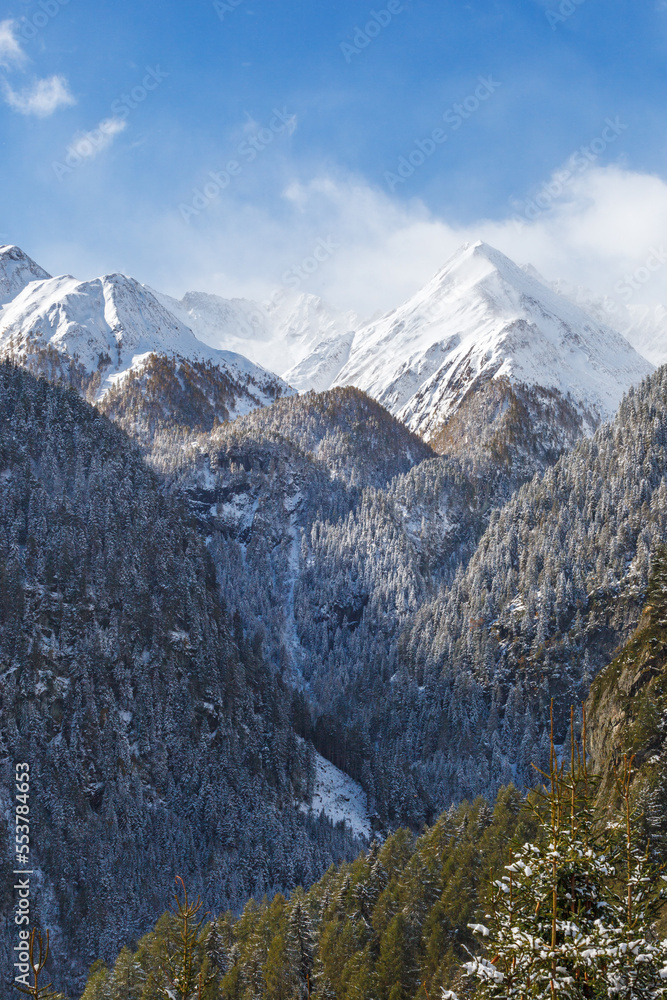 Snow capped mountain peaks in the alps