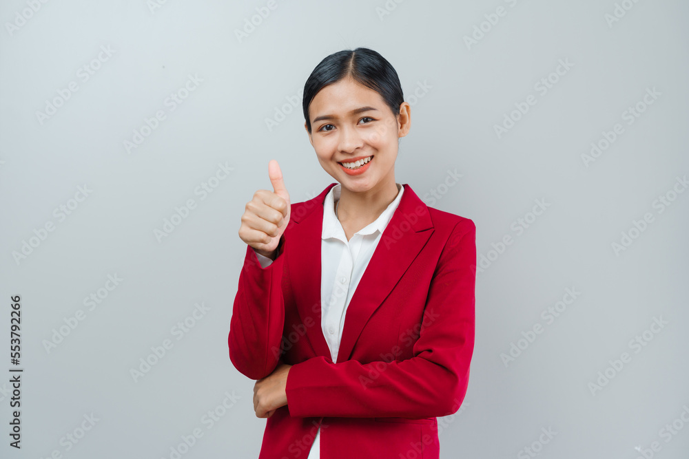 Pretty lovely manager lady successful business asian women in red suit isolated over background. Pretty lovely manager lady successful business asian women in red suit isolated over background.