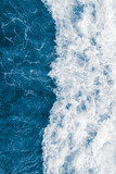 Dark blue sea ocean wave and  liquid white foam