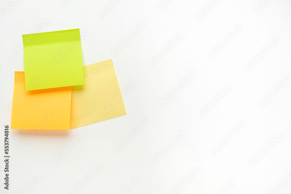 Fototapeta premium Multi-colored blank note papers. Sticker for notes with place for your text