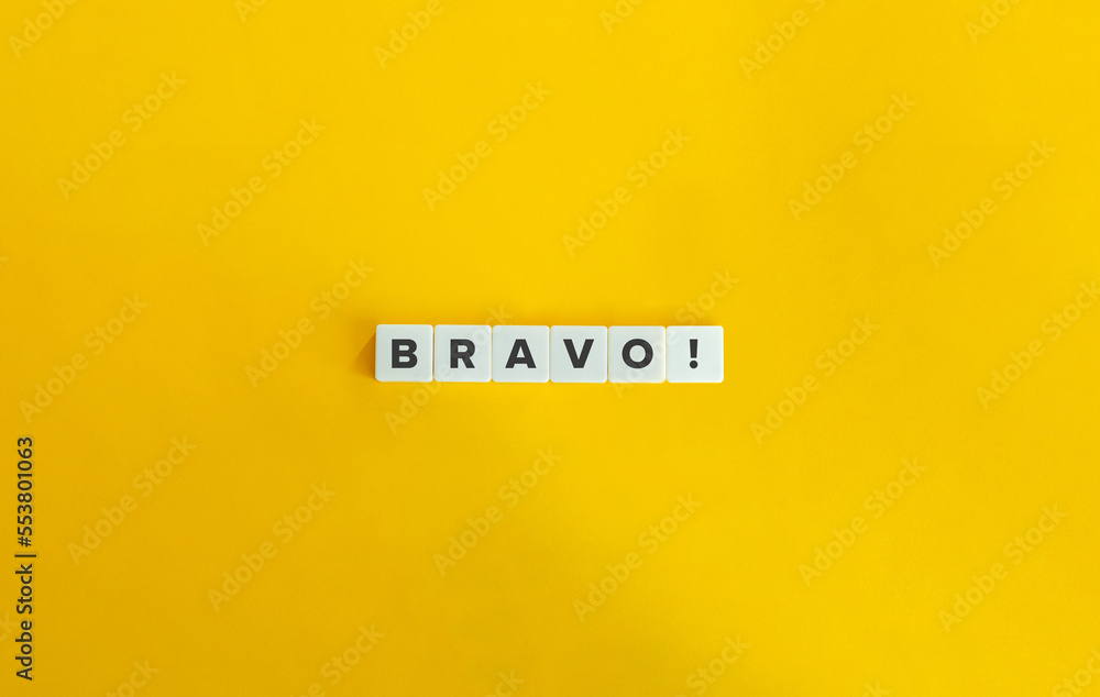 Bravo Word on Letter Tiles on Yellow Background. Minimal Aesthetics. Bravo Word on Letter Tiles on Yellow Background. Minimal Aesthetics.