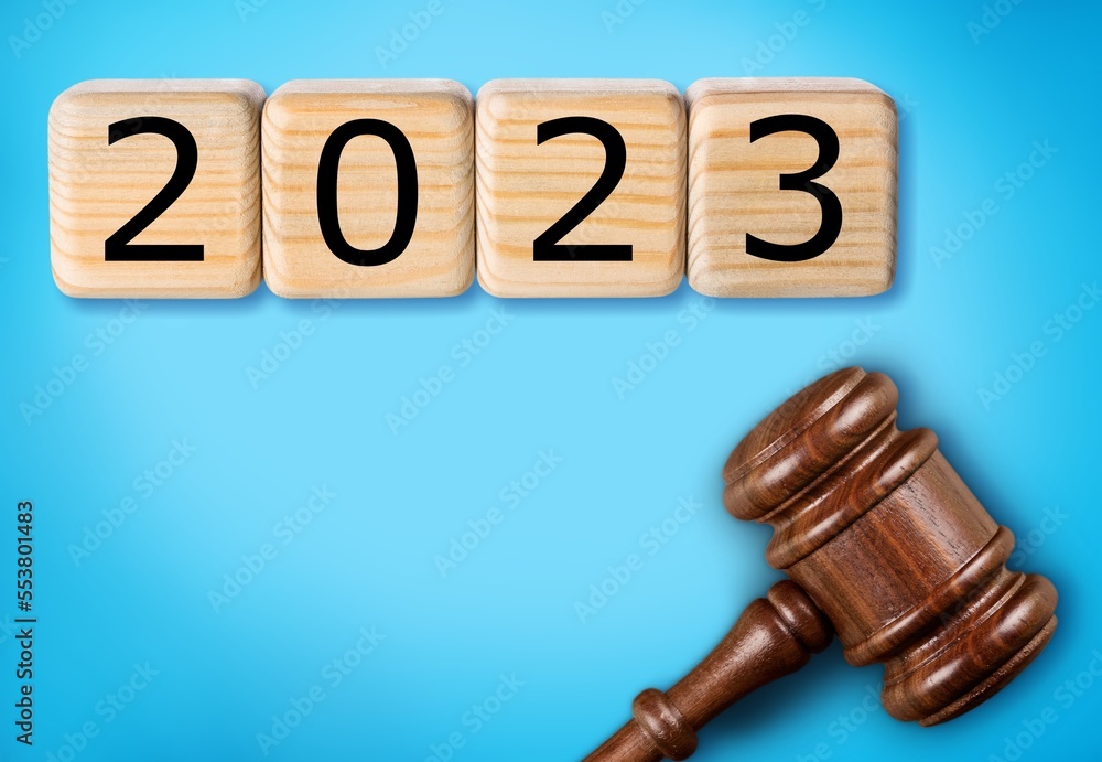 Wooden gavel with 2023 numbers on cubes. Wooden gavel with 2023 numbers on cubes.