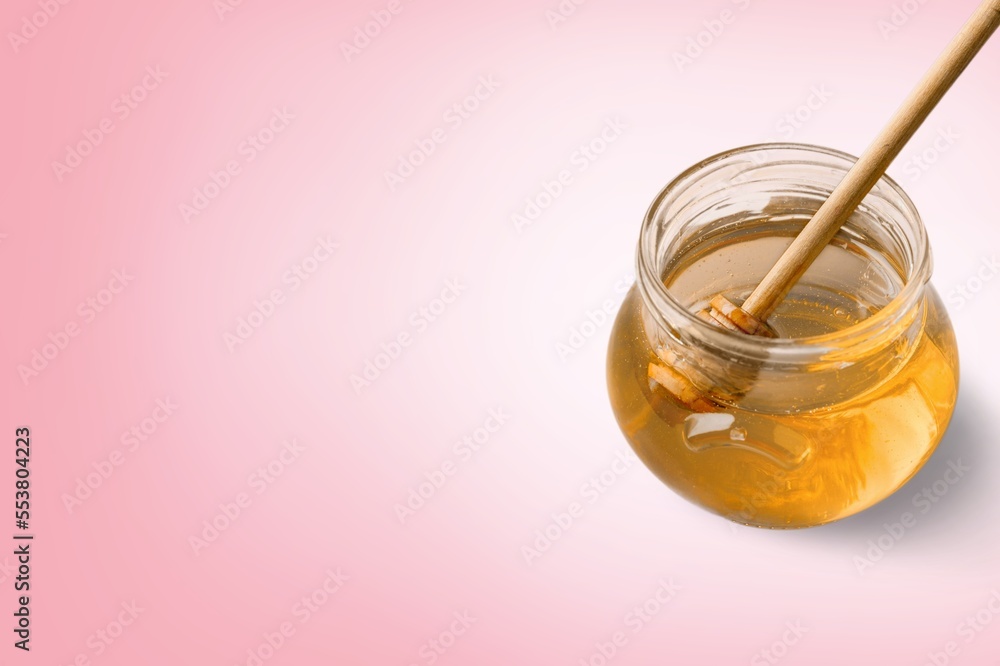 Tasty sweet healthy honey on color background Tasty sweet healthy honey on color background