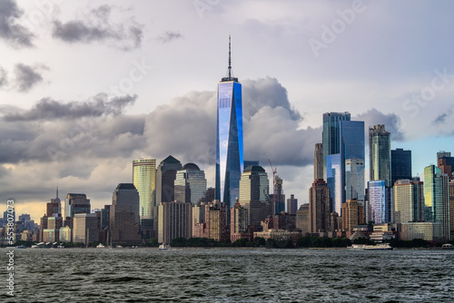 The financial district in the lower Manhattan in New York City with stormy clouds in background.