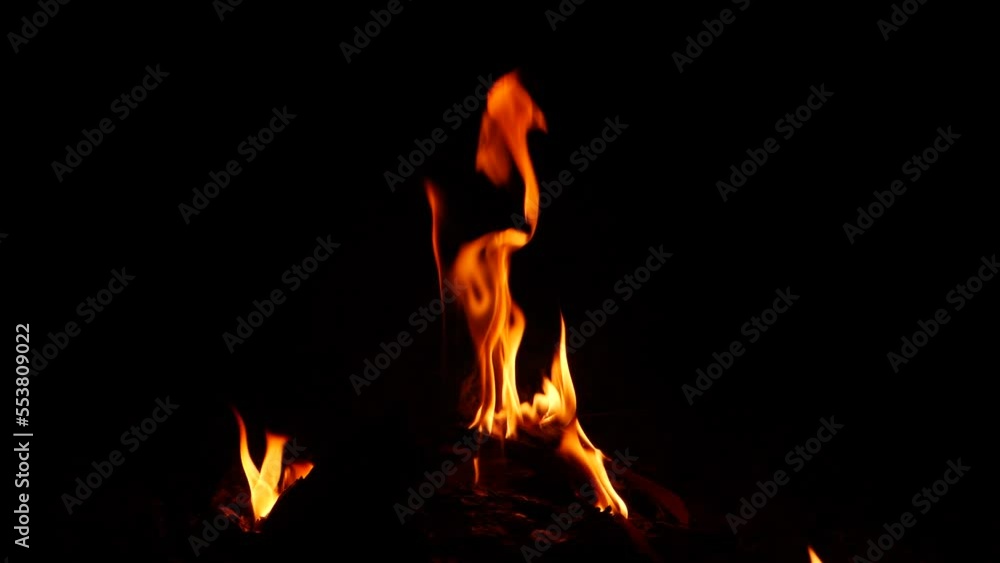 Fire burning an item, burning upward, black background Fire burning an item, burning upward, black background