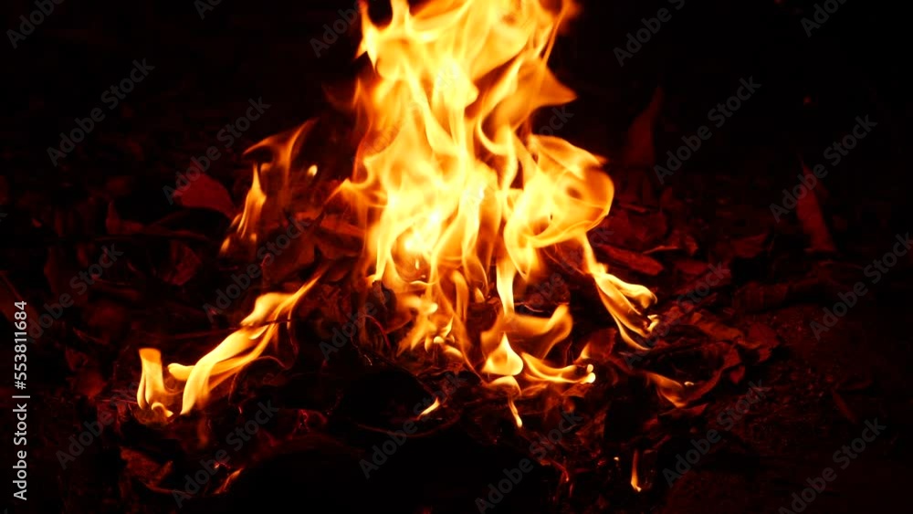 Fire burning vigirously from a substance at spot Fire burning vigirously from a substance at spot