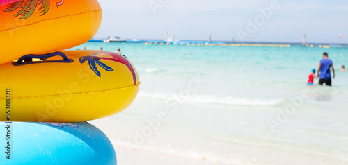 Inflatable rings on the beach. Summer concept