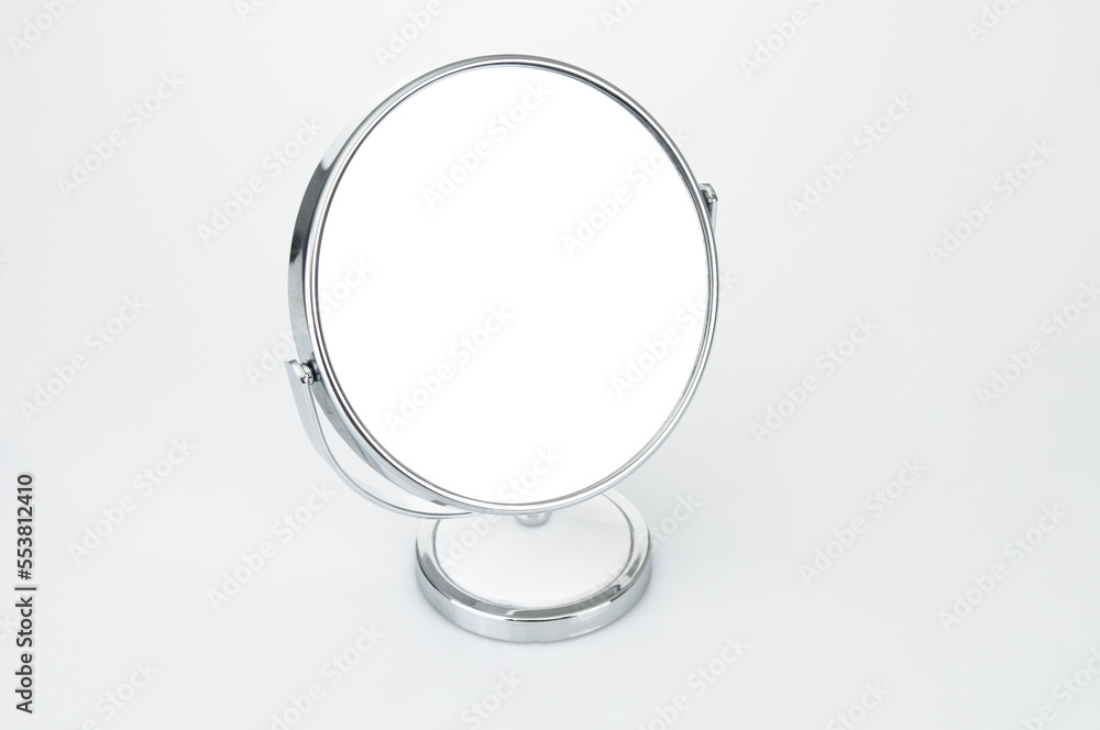 Circle table mirror on a gray background Circle table mirror on a gray background