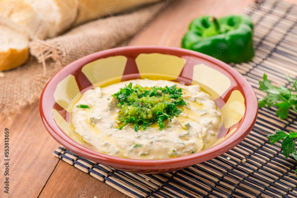 Obraz premium Beiruti hummus served in dish isolated on table side view of arabic food