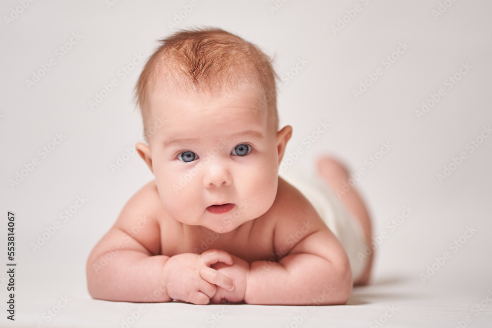 portrait of a child on a white background looking into the camera portrait of a child on a white background looking into the camera
