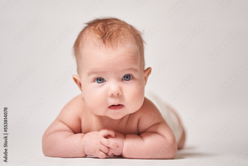 portrait of a child on a white background looking into the camera portrait of a child on a white background looking into the camera