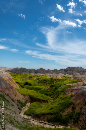 The rugged mountains of the Badlands. These geologic deposits contain one of the world’s richest fossil beds. Ancient mammals such as the rhino, horse, and saber-toothed cat once roamed here © dfriend150