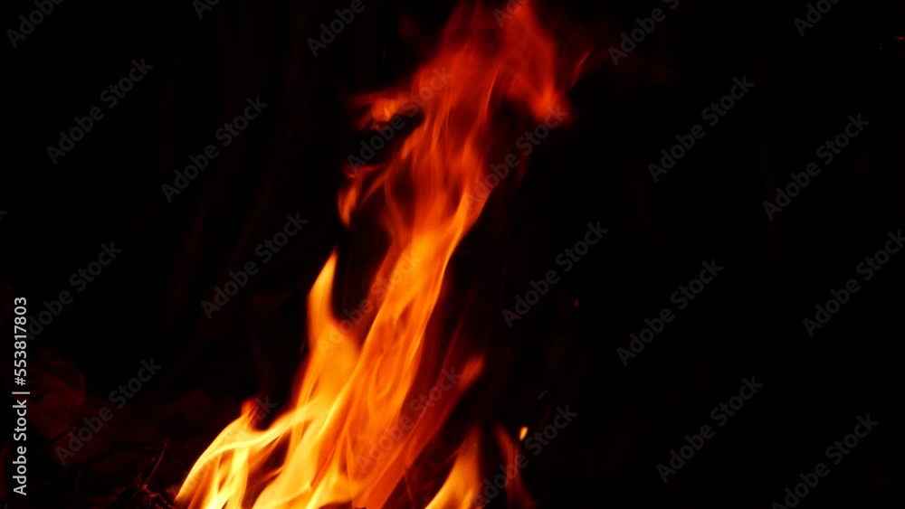 Blazing fire in darkness yellow orange flame Blazing fire in darkness yellow orange flame