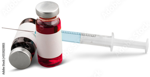 Vaccine bottle  Covid - 19 Corona virus Vaccine injection  and a medical syringe