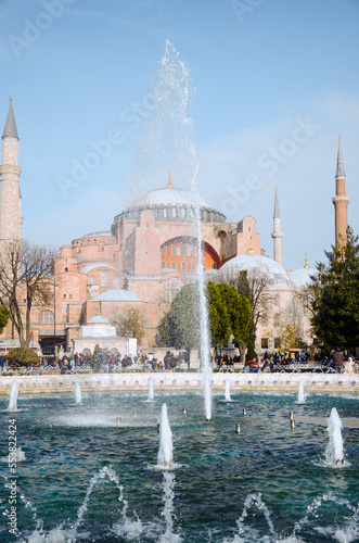 Hagia Sophia -Ayasofya museum and fountain view from the Sultan Ahmet Park in Istanbul, Turkey. It is in use as a church, mosque and museum.