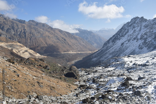 Panoramic landscape view of snowcapped Kala Patthar in sunny winter. It is a famous tourist attraction located in great Himalayas of Sikkim, India