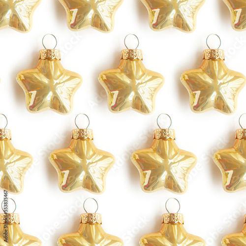 Seamless pattern with Christmas gold stars decorations on white background.