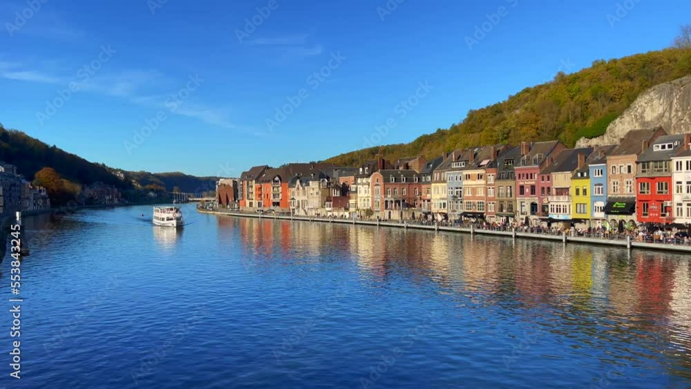 Large ferryboat sailing on the Meuse river in Dinant, Belgium Large ferryboat sailing on the Meuse river in Dinant, Belgium