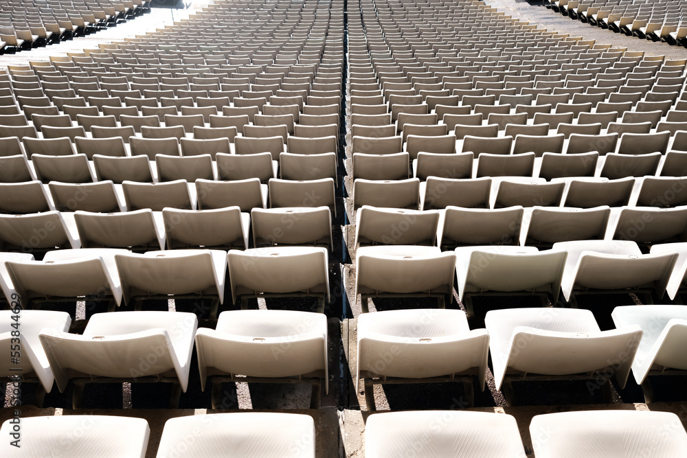 Naklejka premium Detail of the empty stands of a large sports stadium, without attendees.
