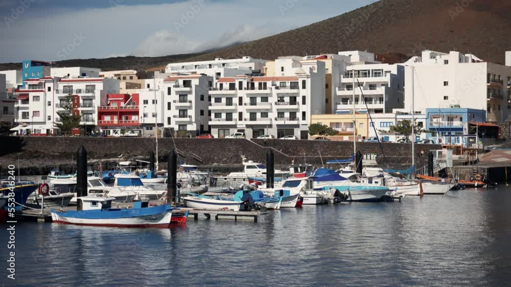 Fishing village with boats and small port in the Canary Islands Fishing village with boats and small port in the Canary Islands