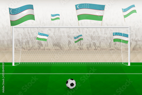 Uzbekistan football team fans with flags of Uzbekistan cheering on stadium, penalty kick concept in a soccer match.