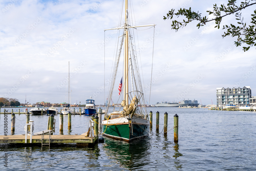 A Sailboat Docked Outside of a Waterfront Condo on the Elizabeth River in Norfolk Virginia