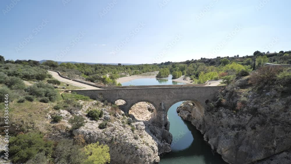 old bridge over the river le pont du diable Herault Occitanie France