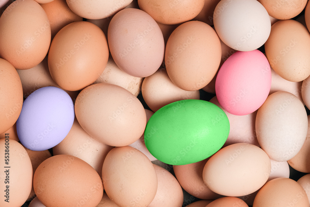 Eggs background. Top view, food background. A lot of organic farm eggs close up. Colored Easter eggs. Eggs background. Top view, food background. A lot of organic farm eggs close up. Colored Easter eggs.