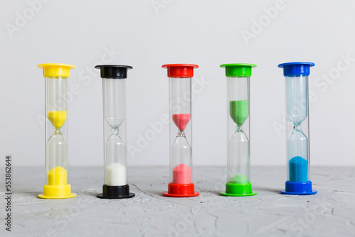 hourglass on the table, sand clock as time passing concept for business deadline, copy space