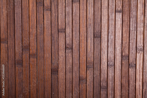 Brown surface of old knotted wood with natural color, texture and pattern