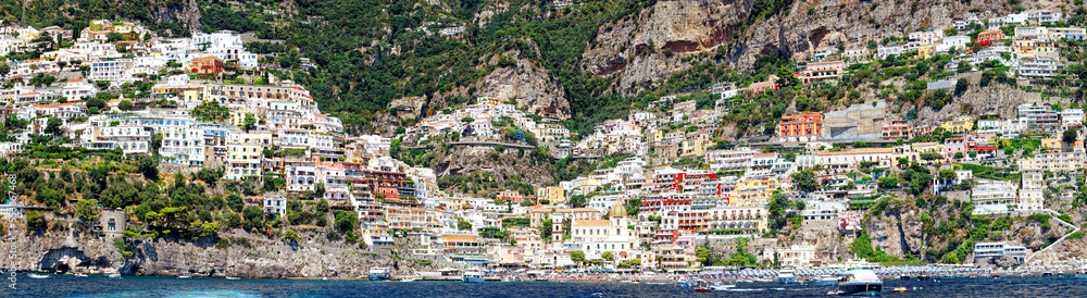 Summer panorama of Positano along the Amalfi coast, seen from the sea in front of the town