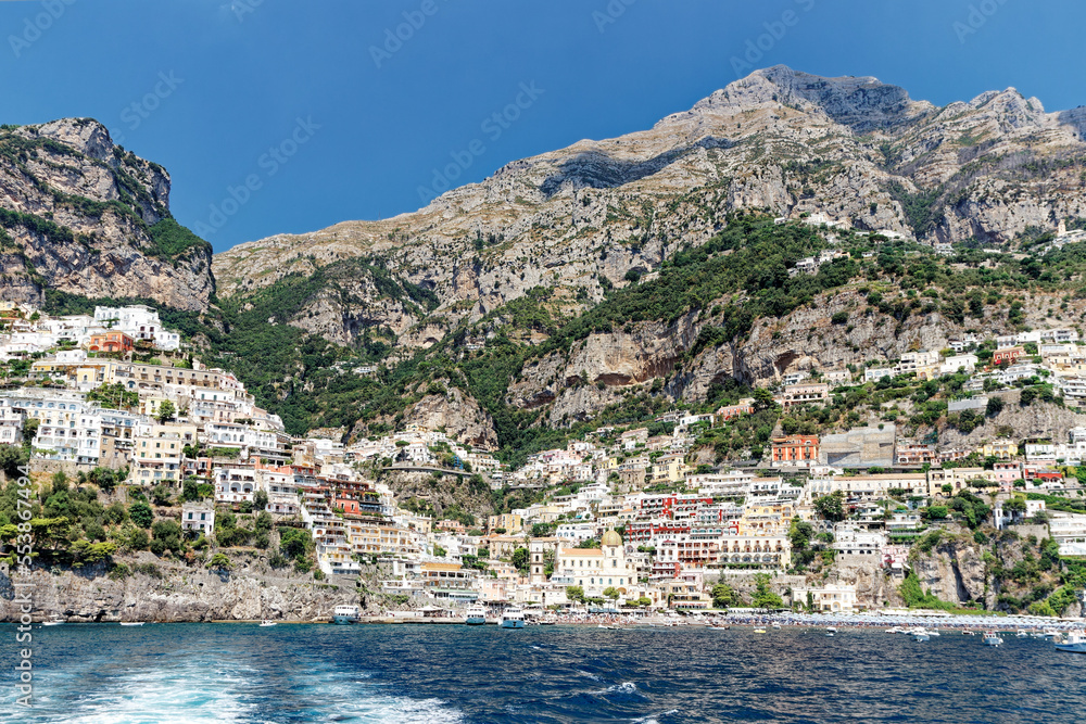 Summer panorama of Positano along the Amalfi coast, seen from the sea in front of the town