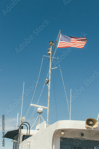 USA flag in a ferry with blue sky  (ID: 553870840)