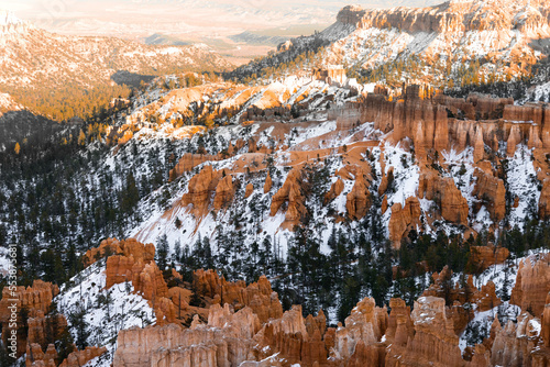 Far away zoom shot of bryce canyon national park of the hoodoos at inspiration point during the winter months in southern utah usa