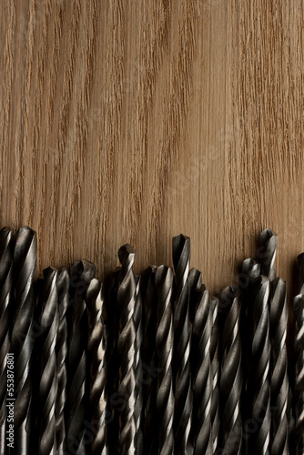 Drill bits on wooden table