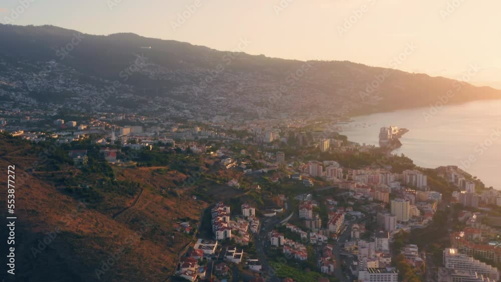 Aerial panoramic view of Funchal city in Madeira at dawn Aerial panoramic view of Funchal city in Madeira at dawn