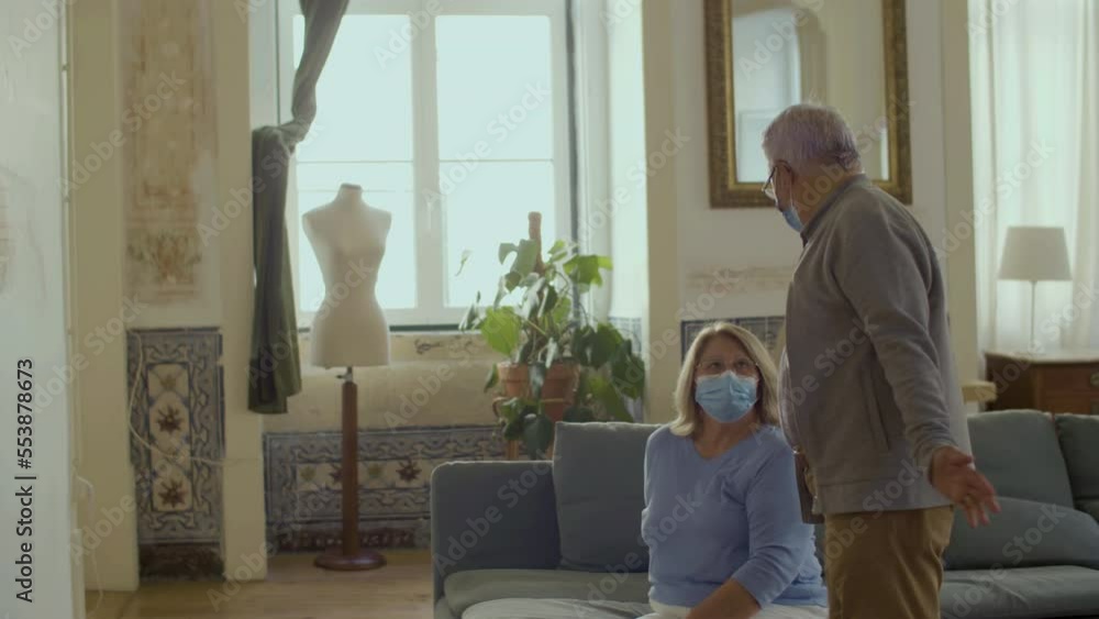 Side view of doctor entering house to vaccinate mature couple. Medium shot of old man and woman calling therapist at home, getting vaccinated against covid. Vaccination at home concept Side view of doctor entering house to vaccinate mature couple. Medium shot of old man and woman calling therapist at home, getting vaccinated against covid. Vaccination at home concept