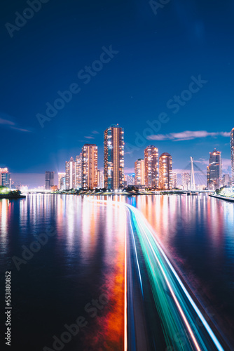 Night view of Sumida River and apartments