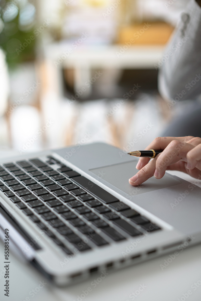 person typing on a laptop