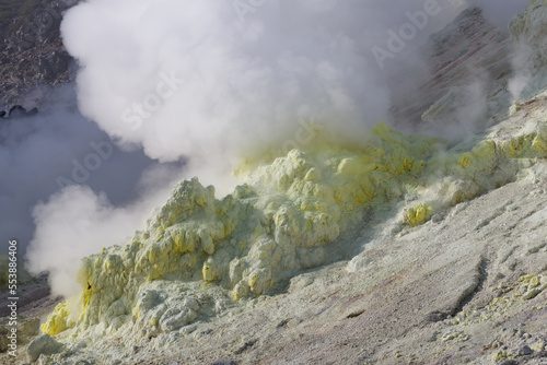 Volcanic landscape of yellow steaming vents