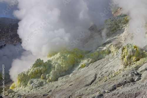 Volcano landscape with steaming fumaroles and sulphur