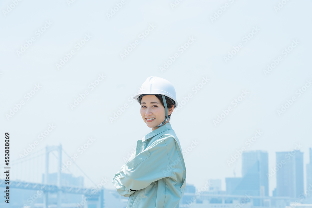 都会で働く作業員（作業服・作業着・スタッフ・建築・建設・仕事）