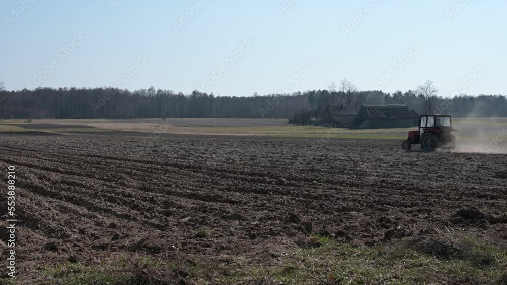 established shot red tractor plowing land field in farm countryside off grid lifestyle concept established shot red tractor plowing land field in farm countryside off grid lifestyle concept