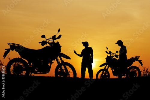 silhouette of a biker