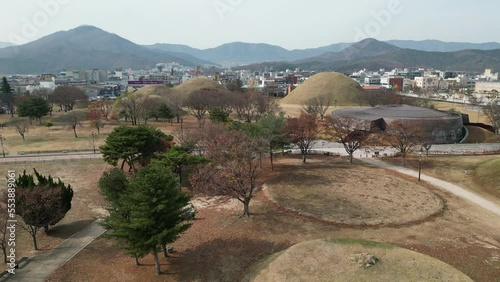 Daereungwon Tomb Complex pond view in winter at Gyeongju, South Korea photo