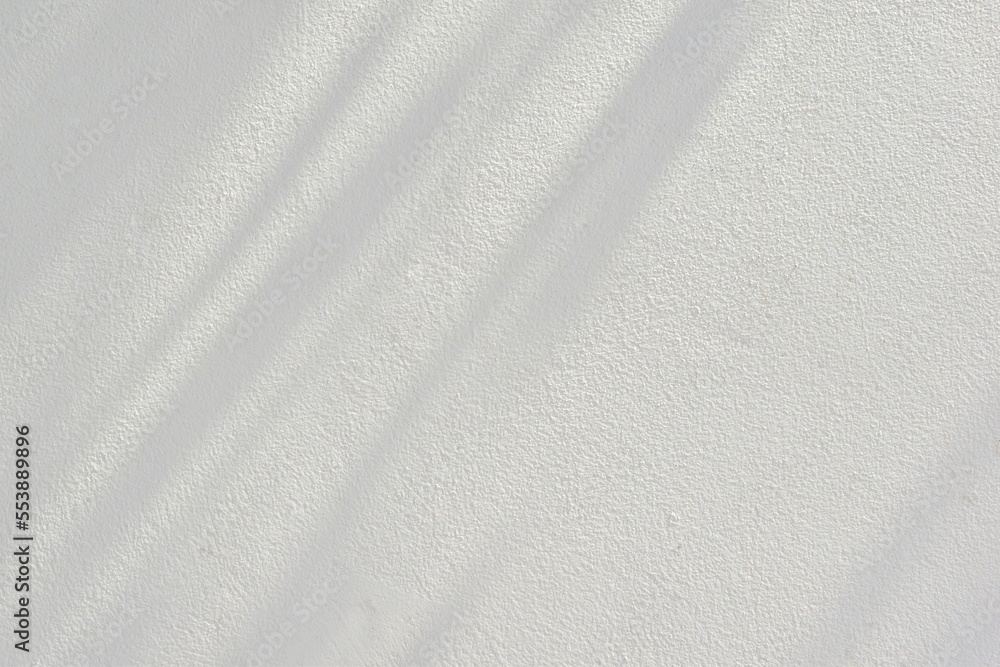 Natural sunlight shadow on beautiful abstract white concrete cement wall background texture Natural sunlight shadow on beautiful abstract white concrete cement wall background texture