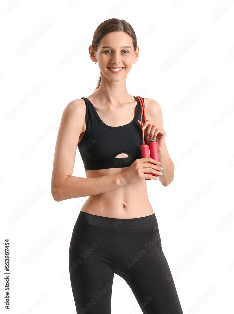 Sporty woman with skipping rope on white background Sporty woman with skipping rope on white background