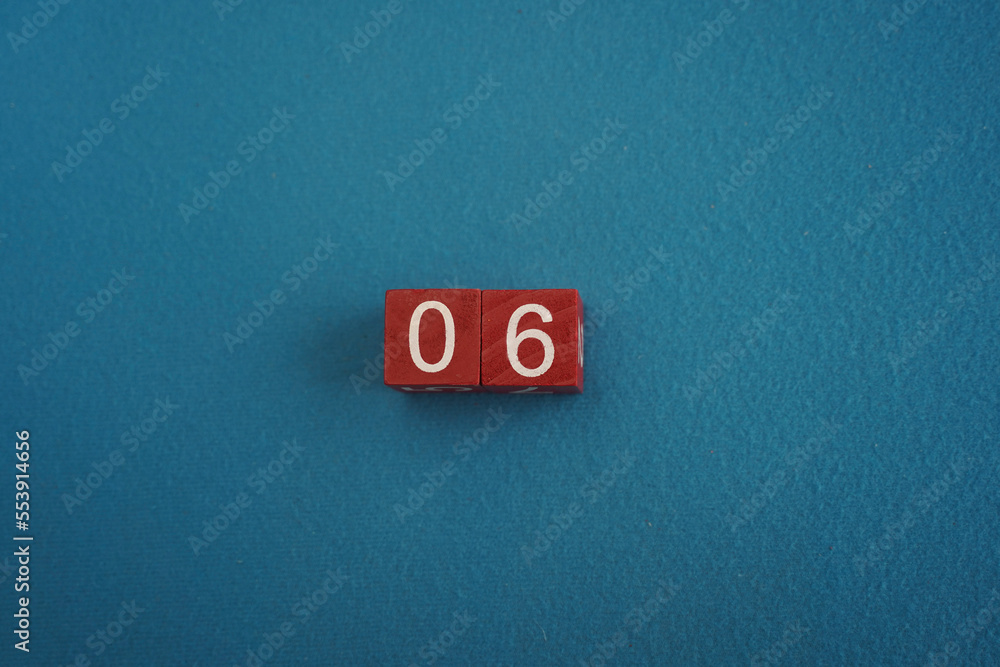 Foto de Wooden Viva Magenta cubes with number 06 blue background close ...