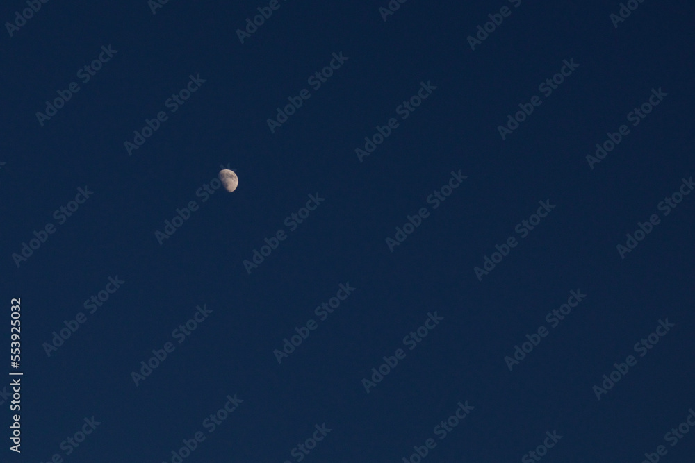 Little moon in the sky. Crescent moon against a dark sky. Little moon in the sky. Crescent moon against a dark sky.