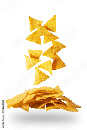 Levitation of corn nacho chips on a white background. Mexican snack